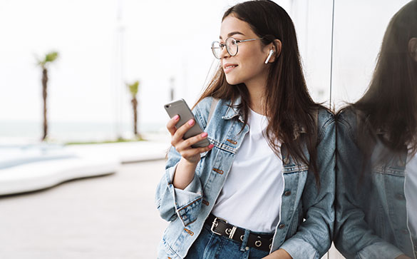 Woman using her mobile phone.