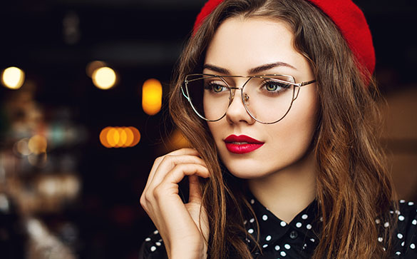 Close up of a girl wearing glasses. 